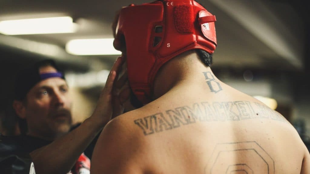person using training helmet inside the ring
