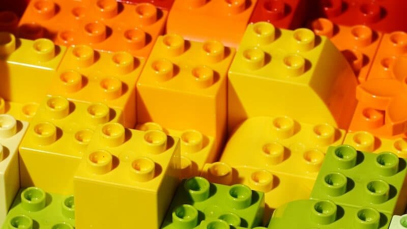 a close up of many different colored legos